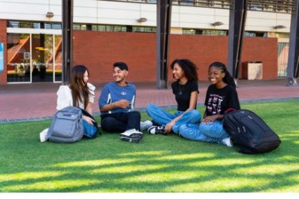 ECC students sitting outside