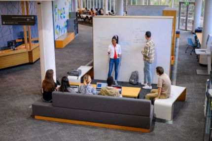 Group brainstorming on whiteboard