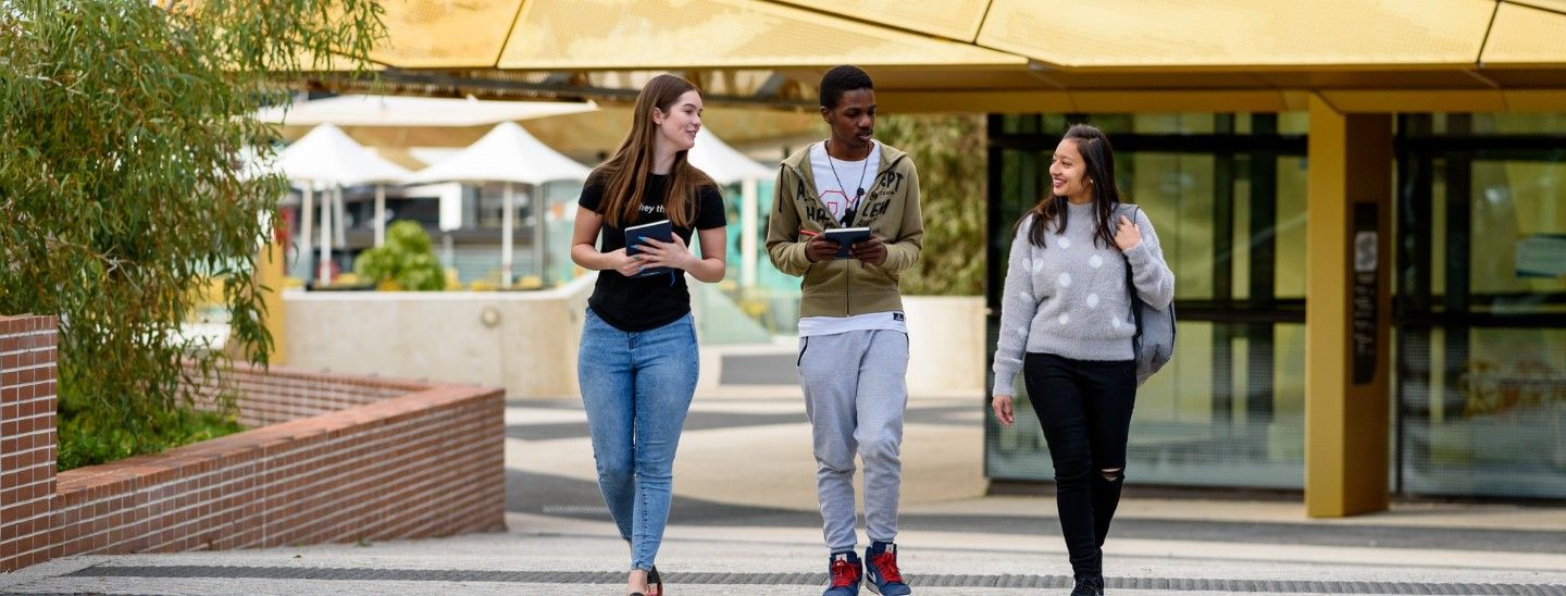 Group outside building walking