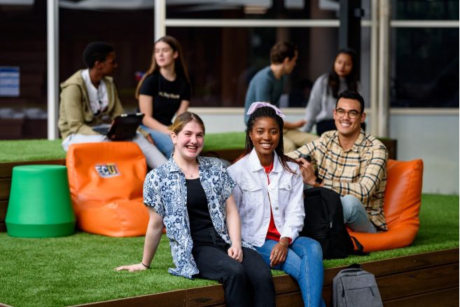 Group sitting on grass