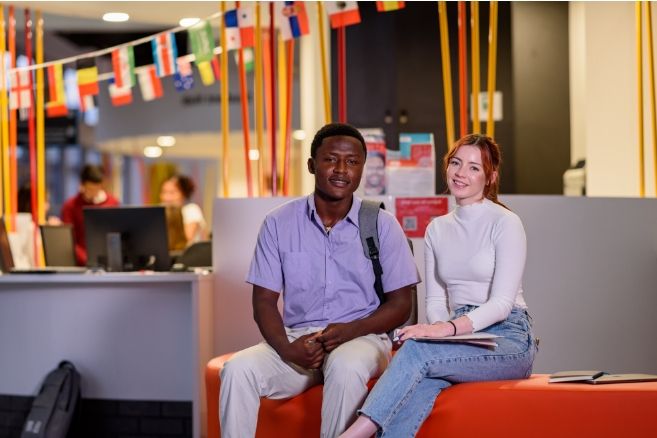Male and female sitting