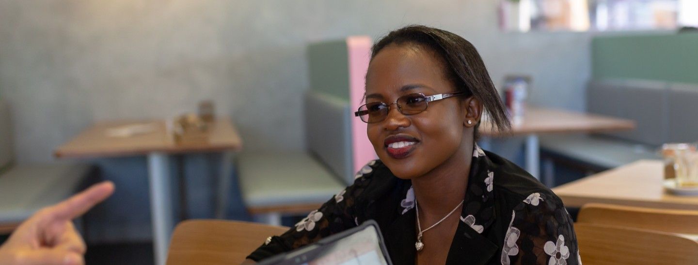 Off campus female sitting in cafe