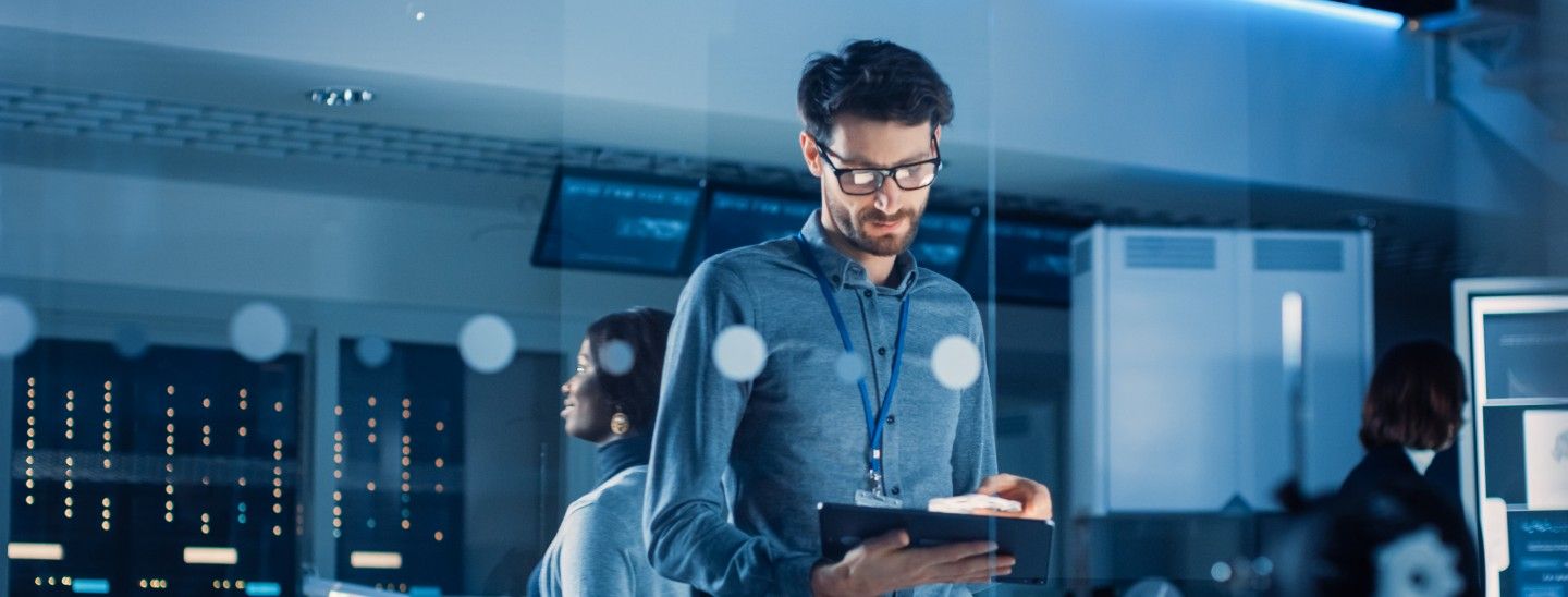 Off campus male using digital pad